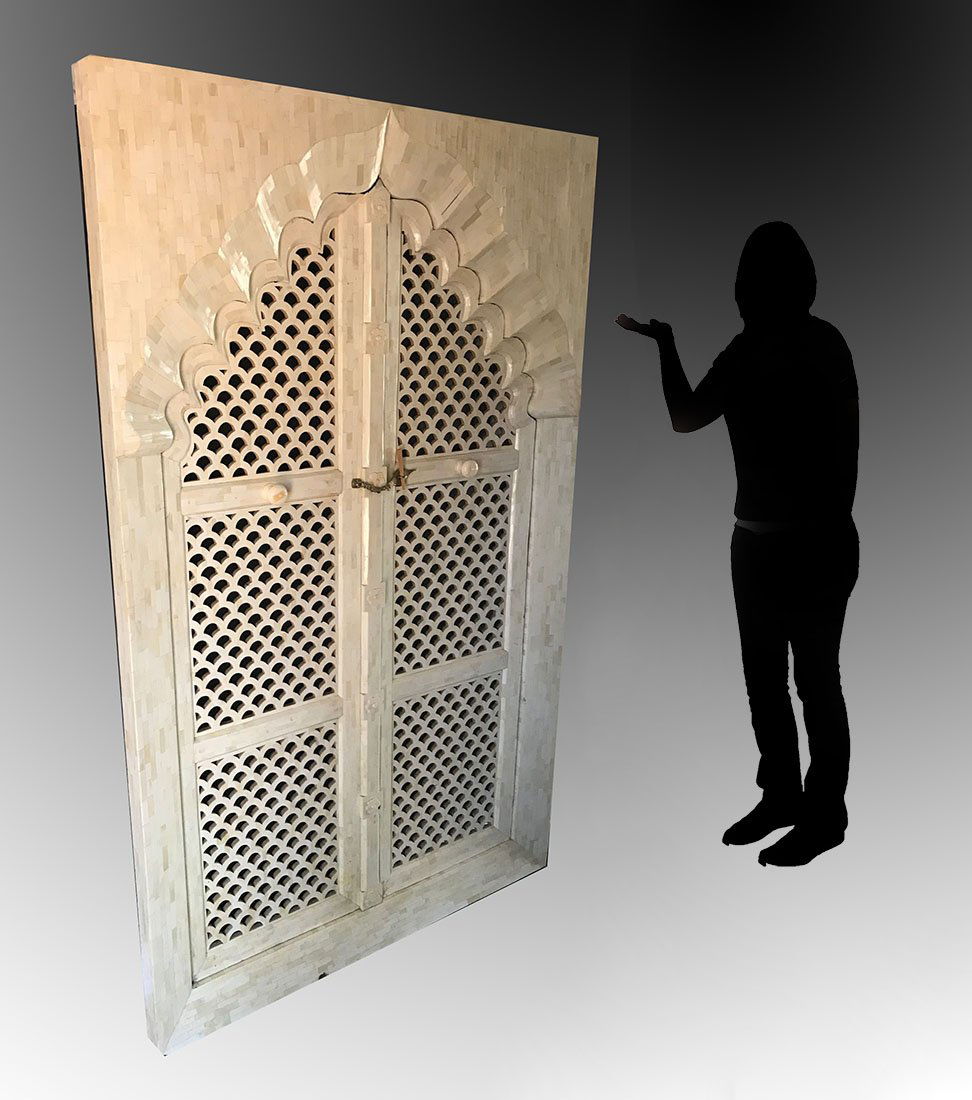 CARVED BONE CLAD MOORISH WINDOW: CARVED BONE CLAD MOORISH WINDOW: Large window clad in bone tiles, reticulated fish scale design window panels, surround with fluted and shaped opening, overall measures approx. 77" h. x 47 3/4" x 2 3/