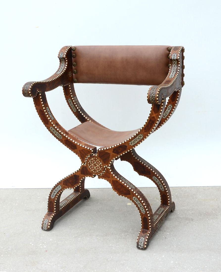 MOROCCAN STYLE INLAID SAVONAROLA CHAIR: MOROCCAN STYLE INLAID SAVONAROLA CHAIR: In the Moroccan style, most likely Northern Italian, bone and fruitwood inly in Moorish patterns with burl veneer panels, leather back and seat, shaped ''X'' fr