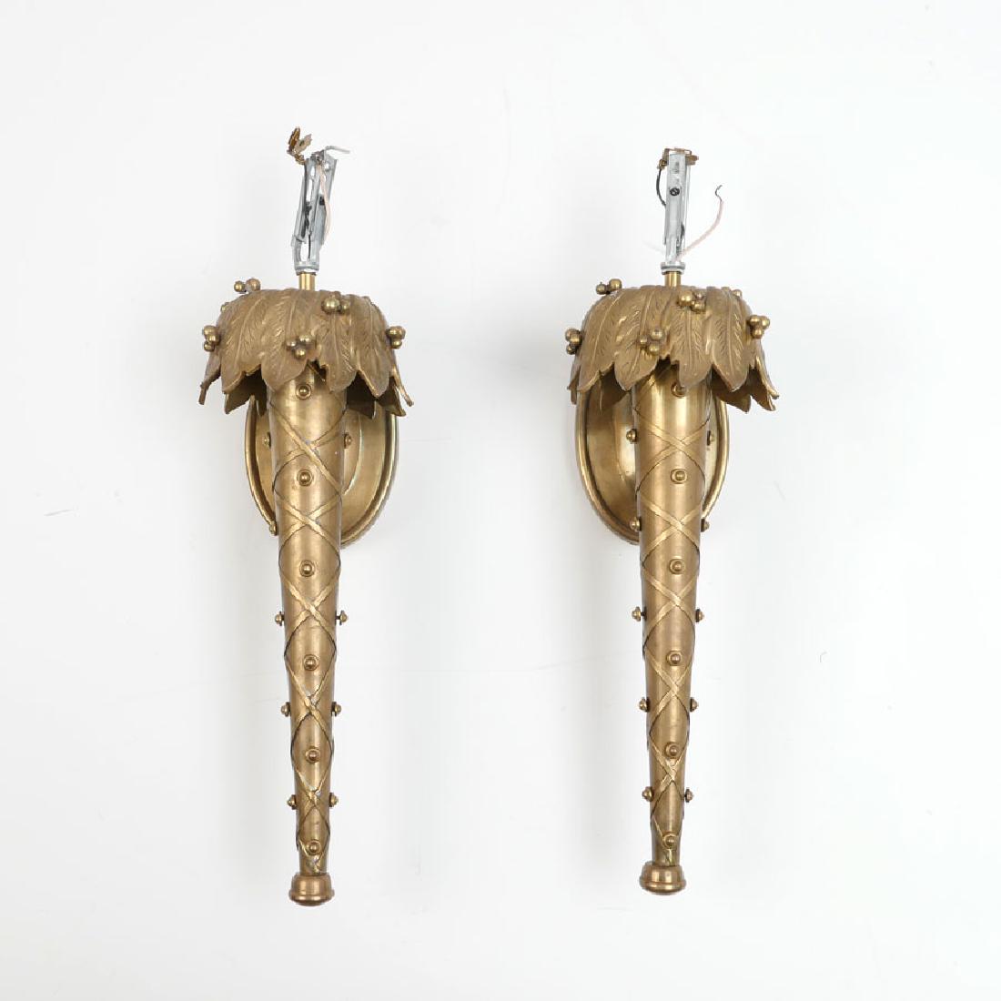 PAIR CHAPMAN BRASS WALL SCONCES: PAIR CHAPMAN BRASS WALL SCONCES: Heavy cast brass torch form with foliate top, no fixture, late 20th century production. 20 1/2'' h. x 6'' x 7''.