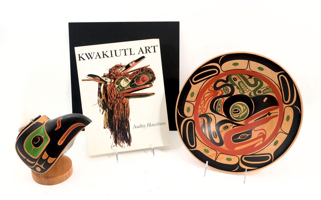 NORTHWEST KWAKIUTL PAINTED BOWL & BIRD MASK: NORTHWEST KWAKIUTL PAINTED BOWL & BIRD MASK: 2 pieces Northwest Native art to include 1) Rod Smith polychrome paint decorated basswood raven mask with applied chicken feathers and stand, 7 1/4'' h. x 