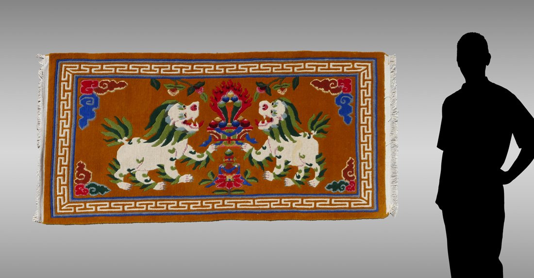 CHINESE HK WOOL RUG, 3" x 6': CHINESE HAND KNOTTED WOOL RUG, 3" x 6': Fun, funky Chinese rug has two white and green "Foo" dogs facing the central design on a cinnamon colored field. Great entryway or conversation piece.