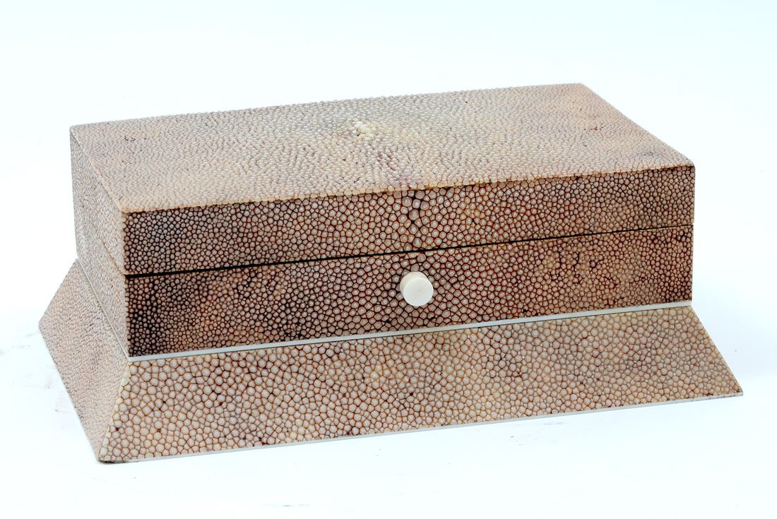 SHAGREEN BOX WITH SECRET COMPARTMENT: SHAGREEN BOX WITH SECRET COMPARTMENT: Art deco Taupe Shagreen (shark skin), covered box with a hidden compartment that con be opened by sliding top section to the right. Approx. 3" h x 8" l x 5.5" w.