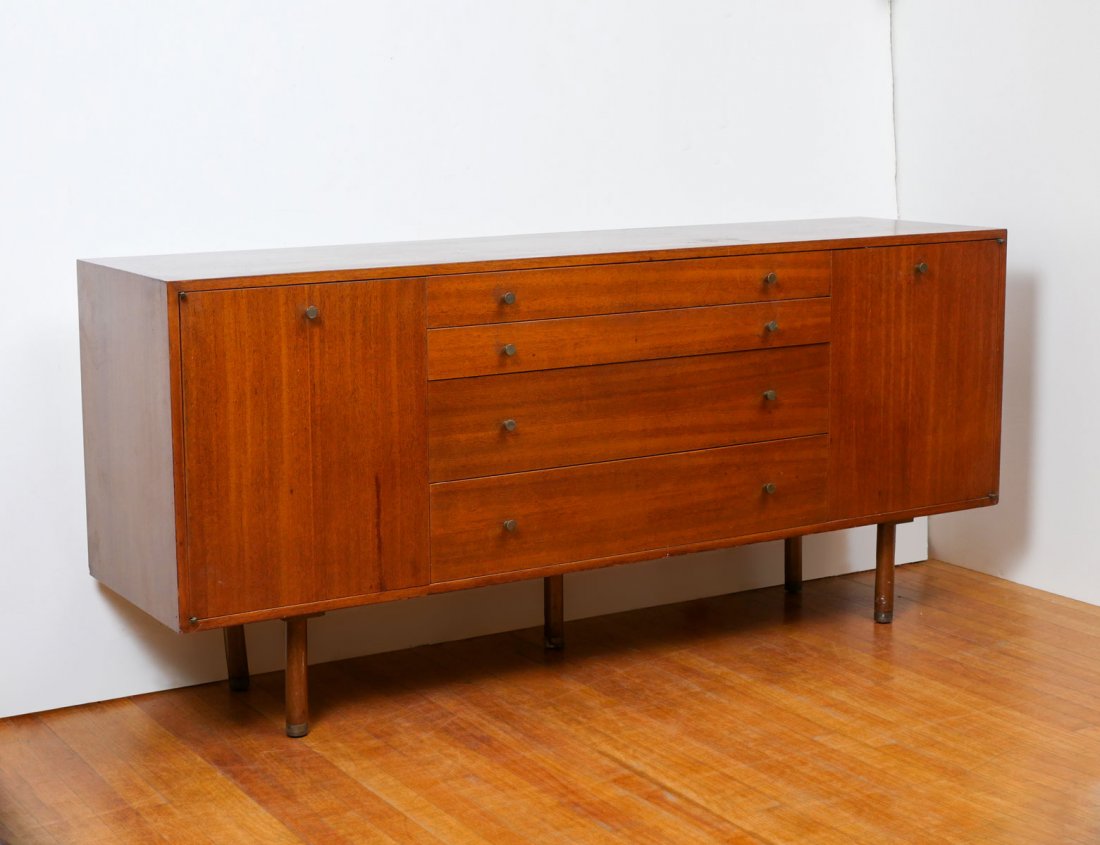 HARVEY PROBBER MID CENTURY CREDENZA SIGNED: HARVEY PROBBER MID CENTURY CREDENZA SIGNED: Designed by Harvey Probber with 4 drawers and 2 Doors, of which all have graduated pulls. Rests on wood supports. Top drawer has the Harvey Probber tag.