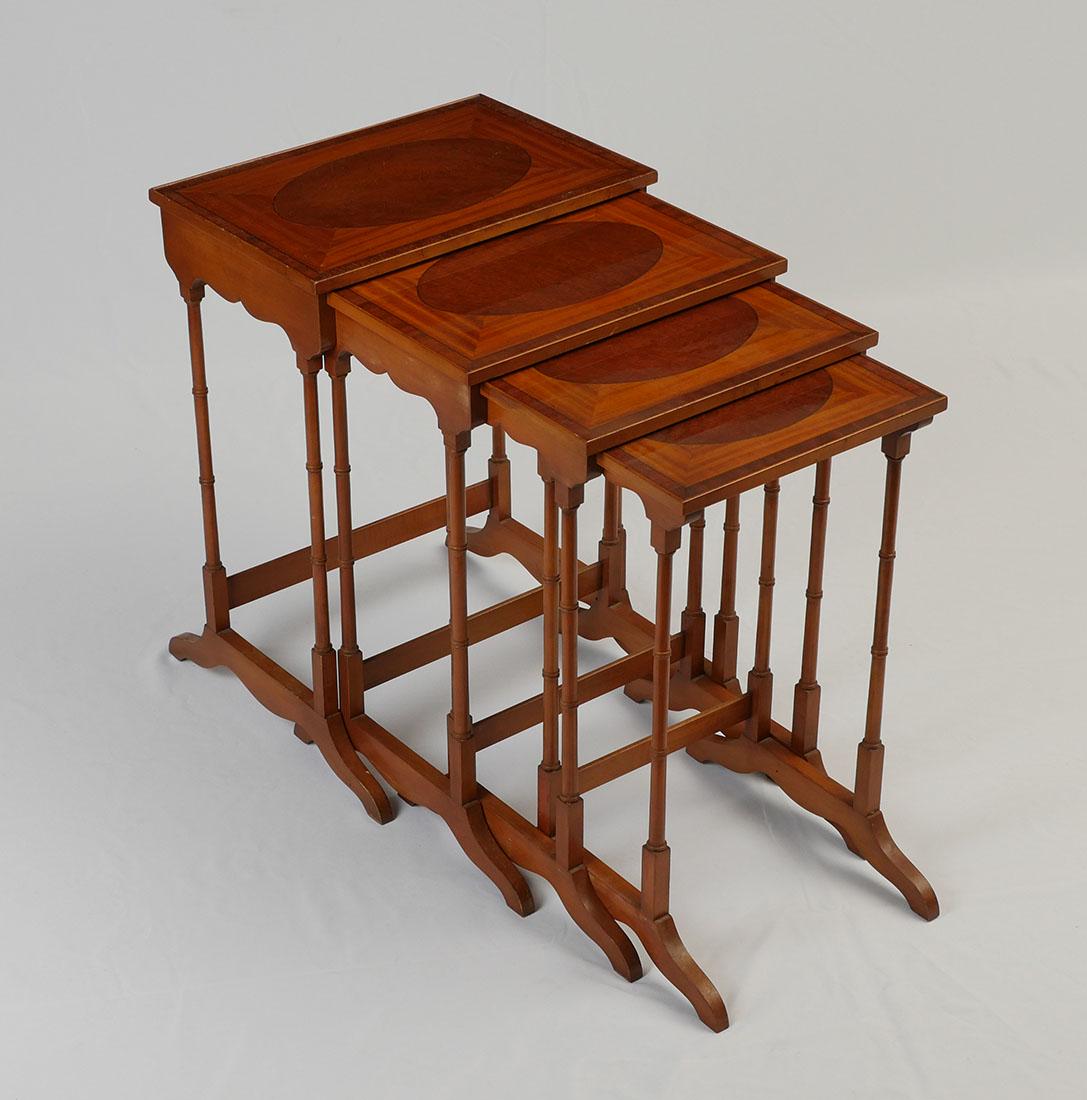 4 VENEERED COLONIAL REVIVAL NESTING TABLES: 4 VENEERED COLONIAL REVIVAL NESTING TABLES: Set of 4 Maple, Burl, and Mahogany veneered Nesting Tables made by ''the Company of Master Craftsmen'' for W. & J. Sloane. Turned bamboo style supports on a