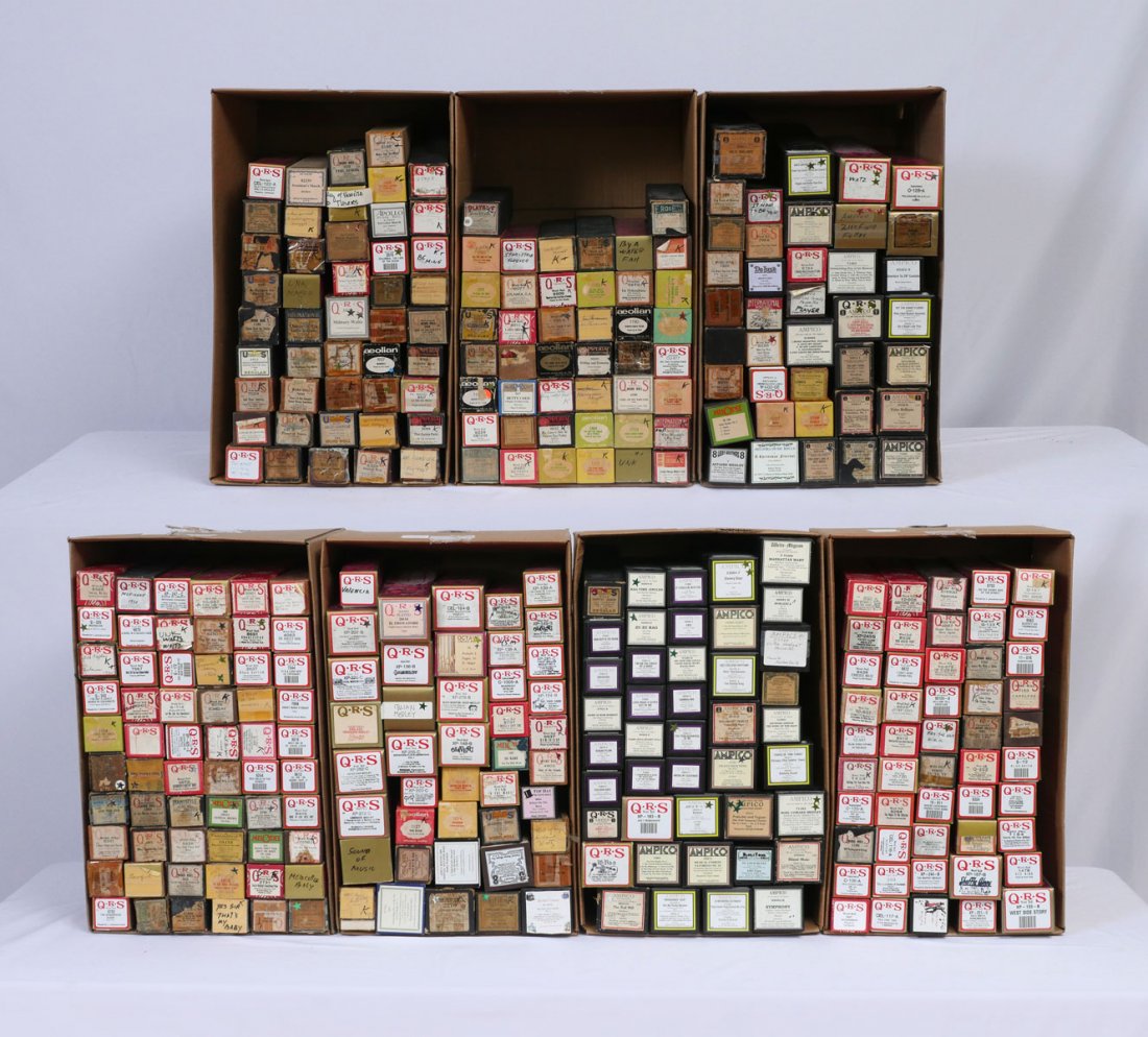 AMPICO AND QRS PLAYER PIANO ROLLS: AMPICO AND QRS PLAYER PIANO ROLLS: An eclectic 7 box collection of approximately 250 Ampico & QRS perforated music rolls for a player piano.