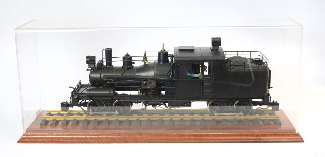 G SCALE CASED BACHMANN SPECTRUM TRAIN ENGINE: G SCALE CASED BACHMANN SPECTRUM TRAIN ENGINE: Large G scale black locomotive engine with great detailing. Brass bells and whistles, fake coal behind the conductor. This is a Spectrum engine made by Ba