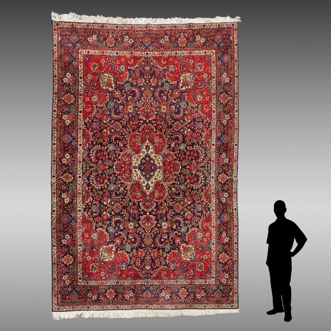 PERSIAN HK WOOL RUG, 9'7" X 13'2": SEMI-ANTIQUE PERSIAN HAND KNOTTED WOOL RUG, 9'7" X 13'2": The blue field of this rug with its red central medallion and corners is densely covered with a variety of classical motifs accented with whit