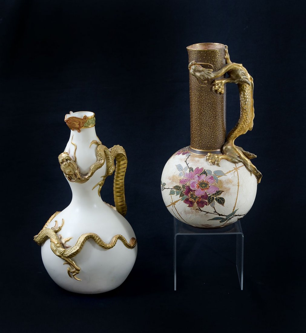 2 PC. DOULTON & ROYAL WORCESTER DRAGOMWARE PITCHERS: 2 PC. DOULTON BURSLEM & ROYAL WORCESTER DRAGONWARE PITCHERS: Royal Worcester dragon ware pitcher in a cream-colored ground with a high relief gilt dragon encompassing to create the handle. Green Worce