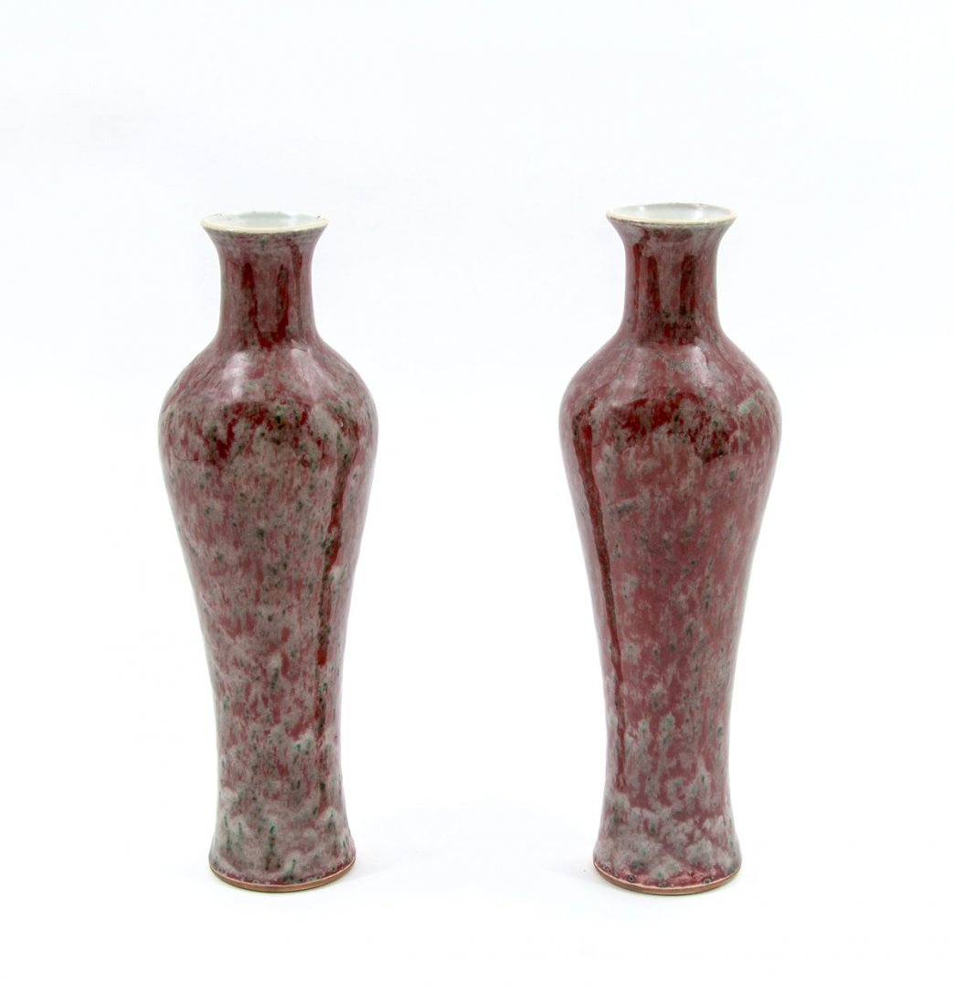 PAIR OF 19TH CENTURY CHINESE MOTTLED GLAZE VASES: PAIR OF 19TH CENTURY CHINESE MOTTLED GLAZE VASES: Pair of 19th century Chinese mottled glaze vase. Red ground with green and grey. Hand-painted blue double circles reside on the underside of both. App