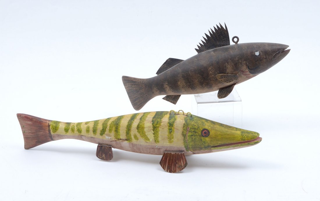 2 PC. SPEAR FISHING DECOYS: 2 PC. SPEAR FISHING DECOYS: Comprising 1 carved and painted swimming walleye decoy with white glass eyes and applied tin fins still intact. Attributed to George John Aho, and 1 carved & painted Muskie