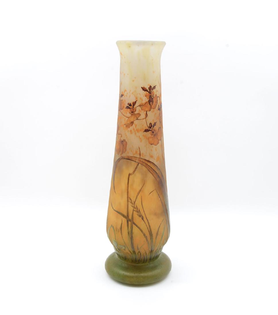 DAUM NANCY LARGE CAMEO IRIS VASE: DAUM NANCY LARGE CAMEO IRIS VASE: Early 20th century fire polished cameo vase with an Iris & foliate motif. Signed in cameo Daum Nancy with cross of Loraine. 19.5'' h x 5.75'' w.