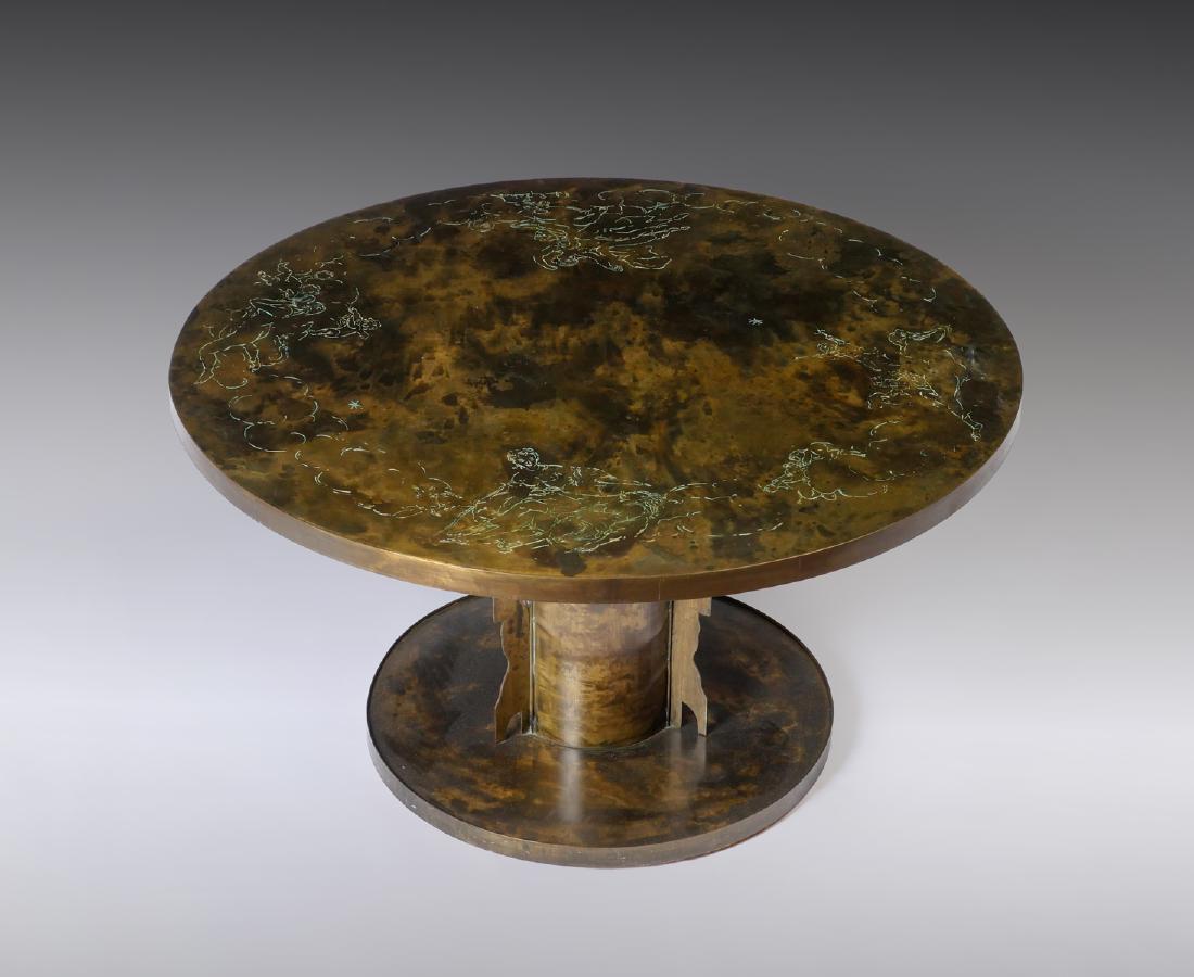 PHILIP & KELVIN LAVERNE COCKTAIL TABLE: PHILIP & KELVIN LAVERNE COCKTAIL TABLE: Brutalist acid etched patinated bronze over wood with a nude women and cherub amongst the clouds motif border cocktail/coffee table by Philip & Kelvin Laverne. 