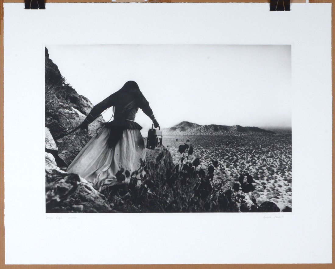 ITURBIDE MUJER/ANGEL PHOTOGRAVURE: ITURBIDE, Graciela, (Mexican, 1942-): "Mujer Angel", Photogravure, 26.125" x 32.25", signed lower right, USF Graphicstudio blindstamp, titled and numbered lower left 17/30, unframed. Can be purchased 