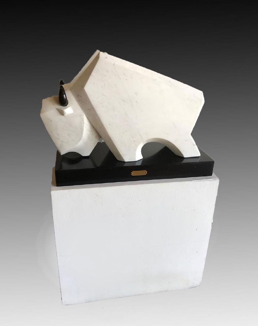 ROBERT DALE TSOSIE ITALIAN MARBLE GREAT WHITE BUFF: ROBERT DALE TSOSIE ITALIAN MARBLE GREAT WHITE BUFFALO: Created by Navajo, Robert Dale Tsosie, this sculpture is made of white & black Italian marble mounted on a rectangular black metal base. Titled G