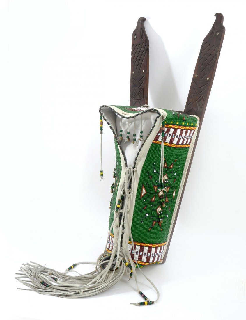 KEVIN FAST HORSE SIOUX INDIAN PAPOOSE BASKET: KEVIN FAST HORSE SIOUX INDIAN PAPOOSE BASKET: This Lone Eagle cradleboard was created, and hand made by Kevin Fast Horse of the Oglala Sioux tribe at Pine Ridge Reservation. 2 carved eagles on top of