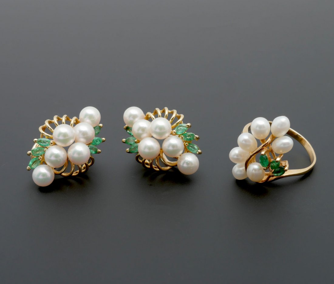 14K PEARL & EMERALD EARRINGS/RING: 14K PEARL & EMERALD EARRINGS/RING: 14K yellow gold earrings and ring contain 19 4.00-5.00 mm cultured pearls. 15 marquise cut emeralds. WEIGHT: .50 Ct. Approx. The pearls are peg and epoxy set. The em