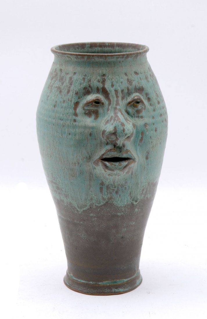 BRUCE FONTAINE FACE POTTERY VASE: BRUCE FONTAINE FACE POTTERY VASE: Circa 1970 face vase art pottery by Bruce Fontaine of Salem, Oregon. Hand-crafted so no 2 are the same. This one has a variegated drip glaze and a face that appears t