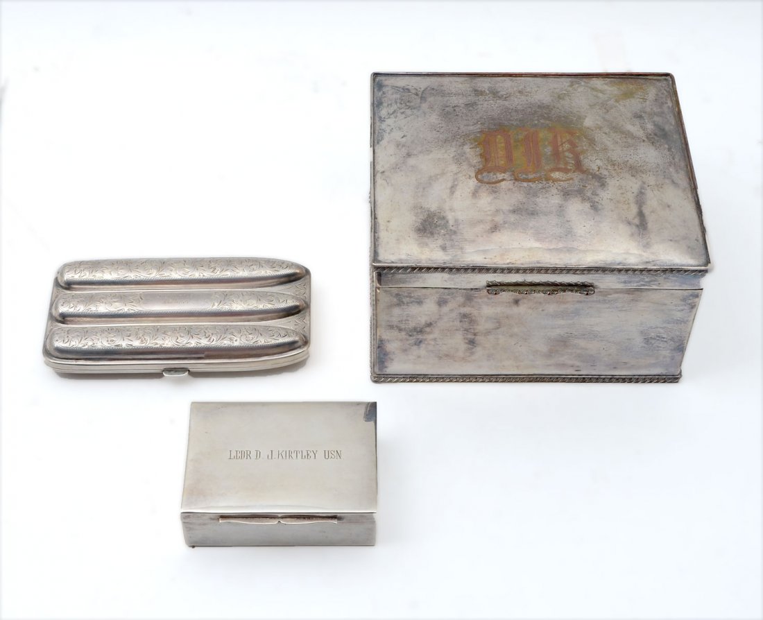 CAPT. DANIEL KIRTLEY TOBACCO BOX SILVER CASE AND CIGAR: CAPT. DANIEL KIRTLEY TOBACCO BOX SILVER CASE AND CIGAR HOLDER: Comprising 1 silver-plated tobacco box with a wood lined interior & DJK monogrammed lid, 1 .900 silver wood lined case with an impressed 