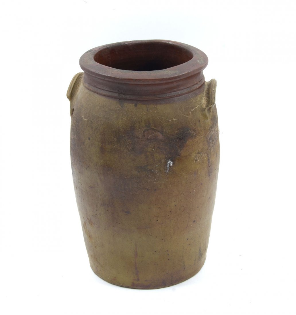 EARLY AMERICAN 3 GAL. CROCK: EARLY AMERICAN 3 GAL. CROCK: Early American 3 gallon hand turned red earthenware crock with mottled glaze below uneven rim and attached handles having an impressed "3" with impressed dots over & under