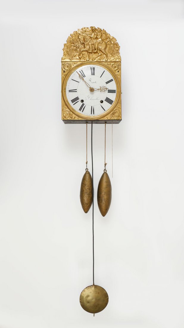 FRENCH WAG ON THE WALL CLOCK: FRENCH WAG ON THE WALL CLOCK: Gilt copper frame having a riders on horseback motif over foliate design encompassing white enameled face with raised black enameled roman numerals. 2- cast iron weights 