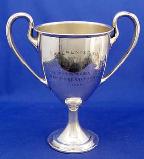 1910 GORHAM STERLING TROPHY Defenders of the Pond: 1910 GORHAM STERLING TROPHY: Inscribed presentation to Scott Wilson Esq. by the "Defenders of the Pond 1910". 9 1/4" tall x 8 5/8" across. Please note slight dings in handles, base. Approx. 13.6 troy