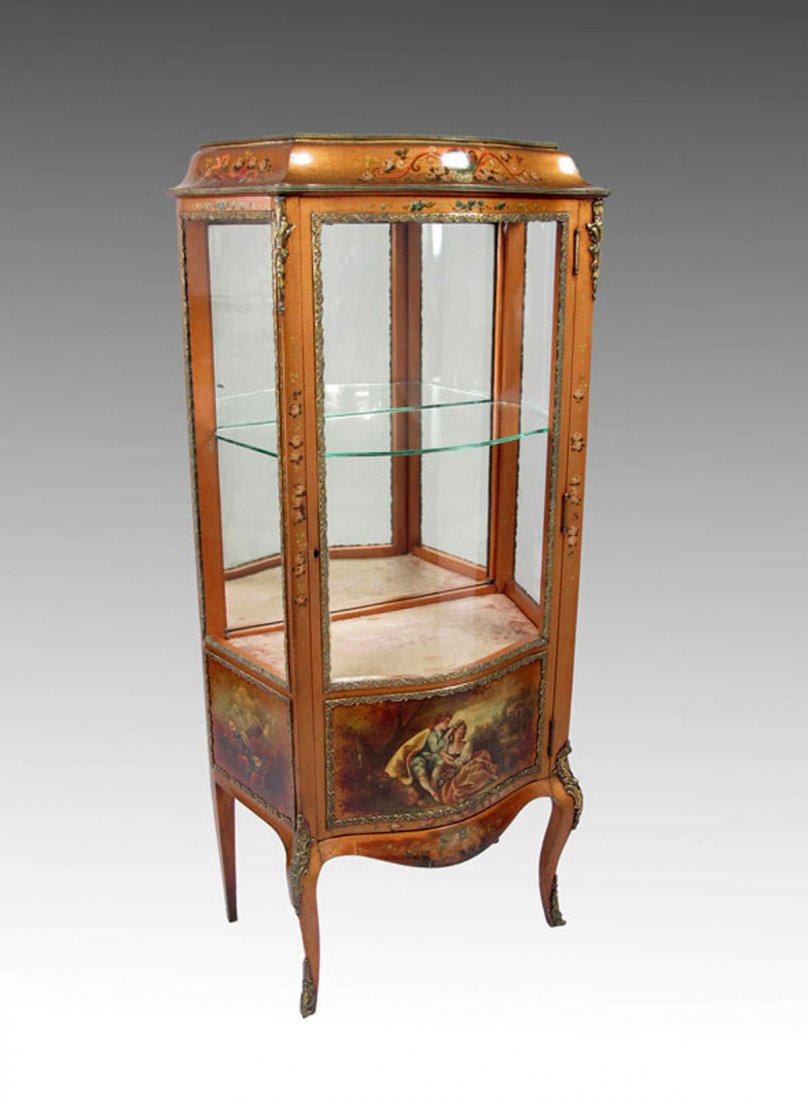 FRENCH PAINTED AND ORMOLU DECORATED VITRINE: FRENCH PAINTED AND ORMOLU DECORATED VITRINE: Hand painted with floral and outdoor genre motifs. Curved glass door, mirrored back, glass shelf, silk lined interior base panel. Ormolu mounted decoration