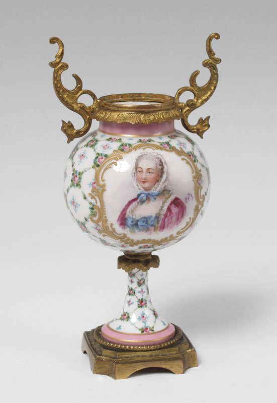 SEVRES ORMOLU MOUNTED FRENCH PORCELAIN URN: SEVRES ORMOLU MOUNTED FRENCH PORCELAIN URN: Portrait of a well to do woman, signed Hete. Underglaze Sevres mark, impressed France on gilt metal base. 8'' h.
