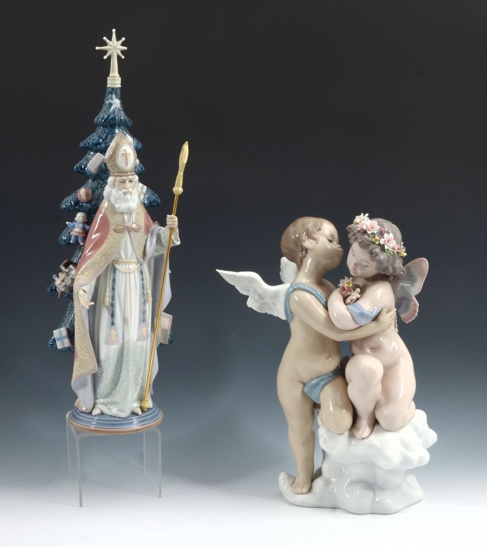2 LARGE LLADRO FIGURINES: 2 LARGE LLADRO FIGURINES: 2 large Lladro figurines to include 1) "Saint Nicholas", sculptor Salvador Furio, issued 1987, retired 1991, 15.25" h. 2) Cherub kissing Fairy, sculptor Fulgencio Polope, 12"