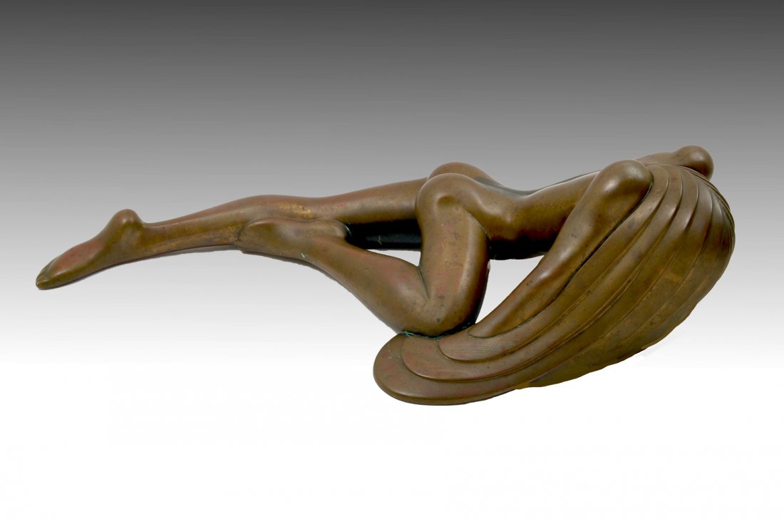 LARGE TOM BENNETT FEMALE NUDE BRONZE: BENNETT, Tom, (American, 1928- ): Sprawling Young Female Nude, Bronze, 9" in height x approximately 37" in length and 20.50" in depth, signed and dated '82, numbered 14 of 100.