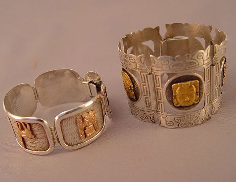 LOT OF 2 STERLING AND 18K PERUVIAN BRACELETS: 2 STERLING AND 18K PERUVIAN BRACELETS: Sterling silver segmented link bracelets with applied 18K yellow gold plaques of Peruvian symbols. Weight: 106.9 grams. Approx. 10. grams of 18K. Approx. 7"