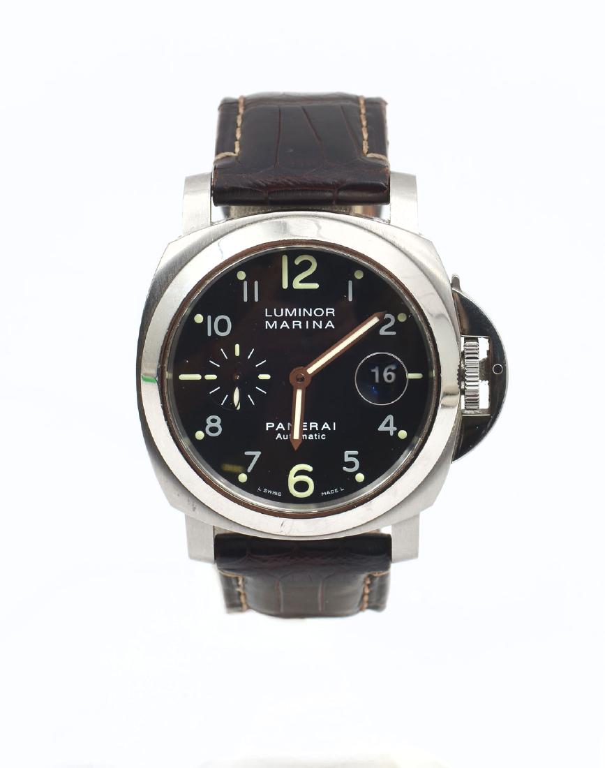 PANERAI LUMINOR MARINA AUTOMATIC: PANERAI LUMINOR MARINA AUTOMATIC: 4mm silver-tone stainless steel case with a black leather strap; rubber strap and watch tool also included. Fixed silver-tone stainless steel bezel. Black dial with b
