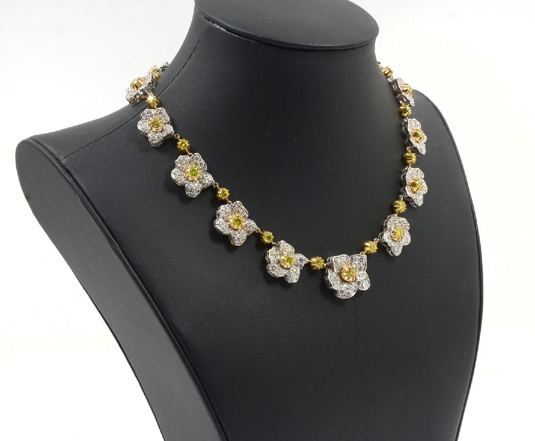 HANDCRAFTED 18K NECKLACE WITH 28CTW DIAMONDS: DAZZLING HANDCRAFTED 18K NECKLACE WITH 28CTW DIAMONDS: One of a kind necklace is made up of 14 flowers each centered with a fancy deep yellow diamond. Yellow diamonds are 7.62CT approx and VS-SI in cl