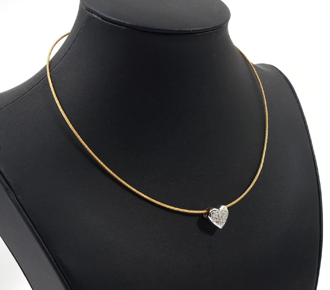 18K ITALIAN CABLE CHOKER & DIAMOND HEART SLIDE: 18K ITALIAN CABLE CHOKER & DIAMOND HEART SLIDE: 16'' yellow gold choker is Italian made, signed and marked. 18K white gold heart slide is pave set with diamonds. 8.5 grams.
