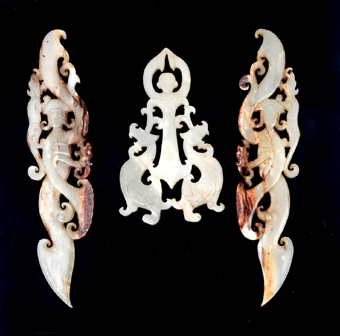 3 PC. HAN DYNASTY CARVED JADE: 3 PC. HAN DYNASTY CARVED JADE: Comprising: 2 opposing carved & pierced jade geisha's in an archaic style with dragon located on back of each geisha having natural brown veins. One carved & pierced gei