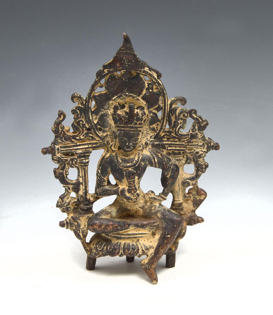 CHINESE BRONZE ALTAR PIECE: CHINESE BRONZE ALTAR PIECE: Early bronze Chinese Quan-Yin resting on a lotus, with openwork Lotus & scrolling design background. Approx. 7" h x 5" l x 1.75" w.