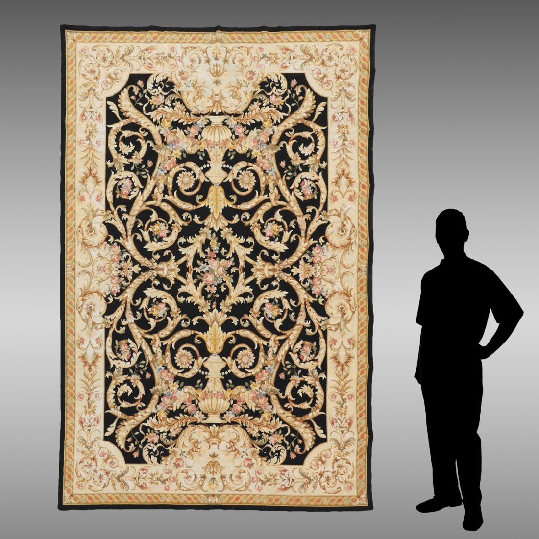SINO-FRENCH AUBUSSON HAND MADE WOOL NEEDLEPOINT RUG: SINO-FRENCH AUBUSSON HAND MADE WOOL NEEDLEPOINT RUG, 5'9" X 8'8": There is a dramatic contrast between the black field and the vases, vines and branches done in golds, yellows and pink.
