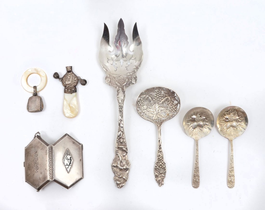 7 PC. STERLING SILVER COLLECTION: 7 PC. STERLING SILVER COLLECTION: Approx. 13.21 Troy ounces. Comprising 1- pierced grapevine pattern spoon by Watson Co. of Massachusetts, 2- S. Kirk & Sons "Forget Me Not" pattern, 1- Reed & Barton "