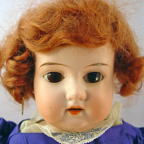 BISQUE PORCELAIN SHOULDER HEAD DOLL