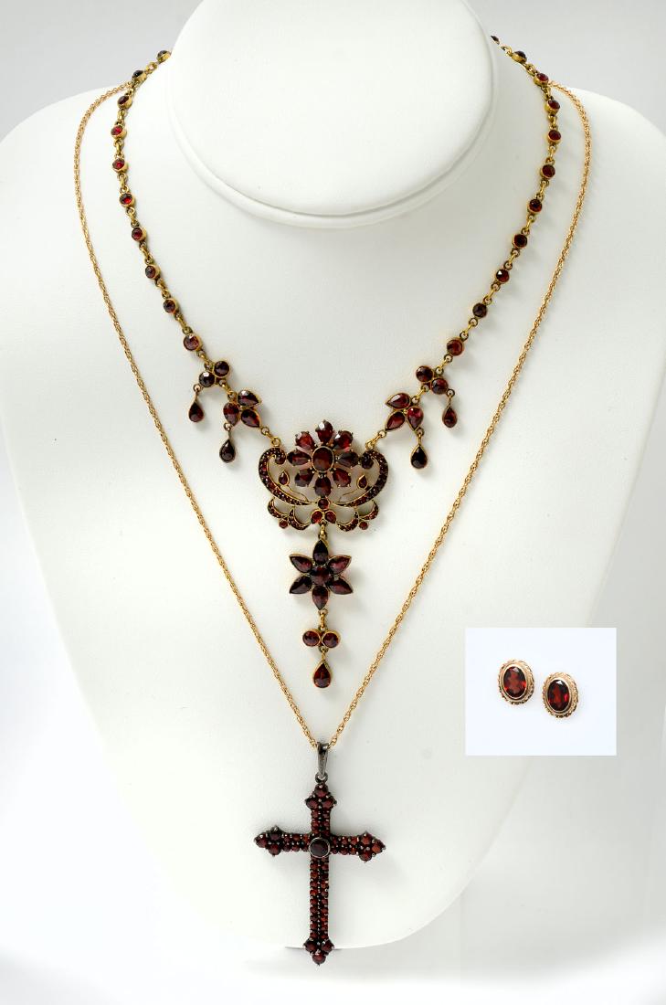 3 PC 10K & 14K GARNET JEWELRY: 3 PC 10K & 14K GARNET JEWELRY: 1) Sterling cross with faceted glass, 14K 24'' chain.; 2) 10K garnet earrings; 3) Turn of the century gilded metal collet set Bohemian garnet necklace with14K clasp - Li