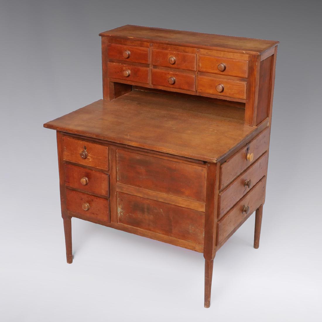 RARE SHAKER SISTER'S SEWING DESK: RARE SHAKER SISTER'S SEWING DESK: 19th Century Shaker Sister's sewing desk of Pine & Birch, having 6 upper drawers, pull out surface over 3 3 front side drawers, and 3 drawers at right side. Wood peg