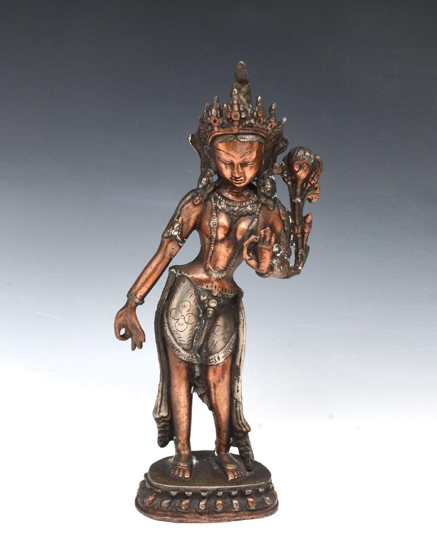 TALL CHINESE SILVER & COPPER QUAN YIN STATUE: TALL CHINESE SILVER & COPPER QUAN YIN STATUE: Chinese Silver & Copper Quan-Yin statue having a flower at left arm. Standing on a lotus base. Approx. 11.75'' h x 5'' l x 3'' w.