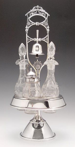 Simpson Hall Miller SILVER PLATE CASTOR WITH BELL: SIMPSON HALL & MILLER UNUSUAL SILVER PLATE CASTOR WITH BELL: Removable bell fits into handle, etched bottles. 17 1/2" tall.