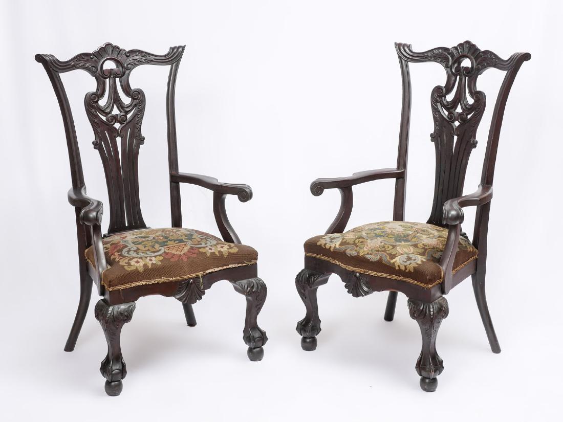 PAIR OF 19TH C. CHIPPENDALE CLAW ON DOUBLE BALL CHAIRS: PAIR OF 19TH C. CHIPPENDALE CLAW ON DOUBLE BALL CHAIRS: 2 Edwardian Chippendale armchairs having a scrolling crest rail & back splat, Serpentine arms with scrolling knuckles, upholstered in a needlepo