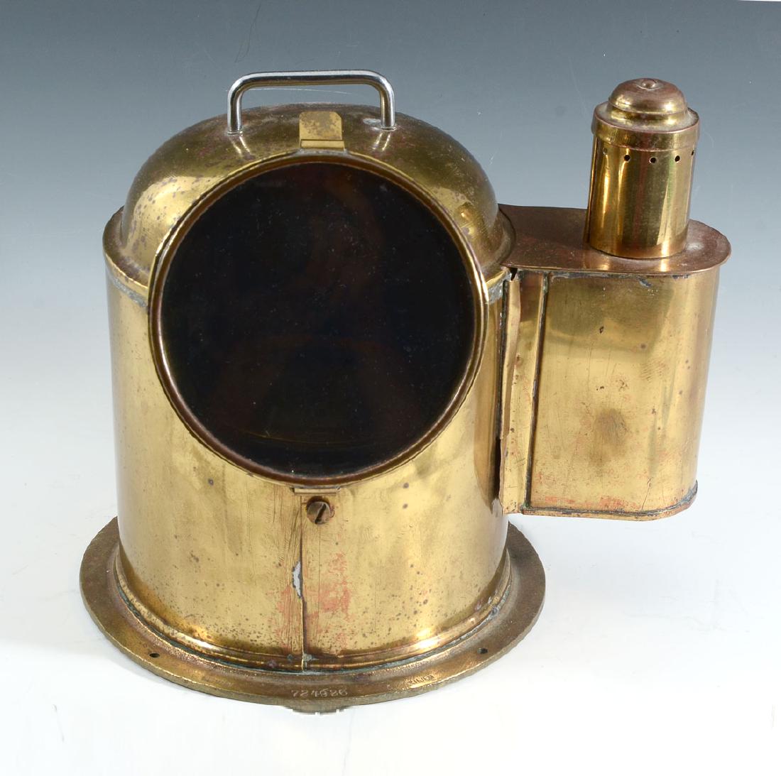GERMAN SHIP'S BINNACLE COMPASS: GERMAN SHIP'S BINNACLE COMPASS: German ship's binnacle having a side mounted illumination lamp. Compass has impressed ''W. Hartmann, 3''. Binnacle bares an impressed ''Neptun, #724926, THJEM'', at mou