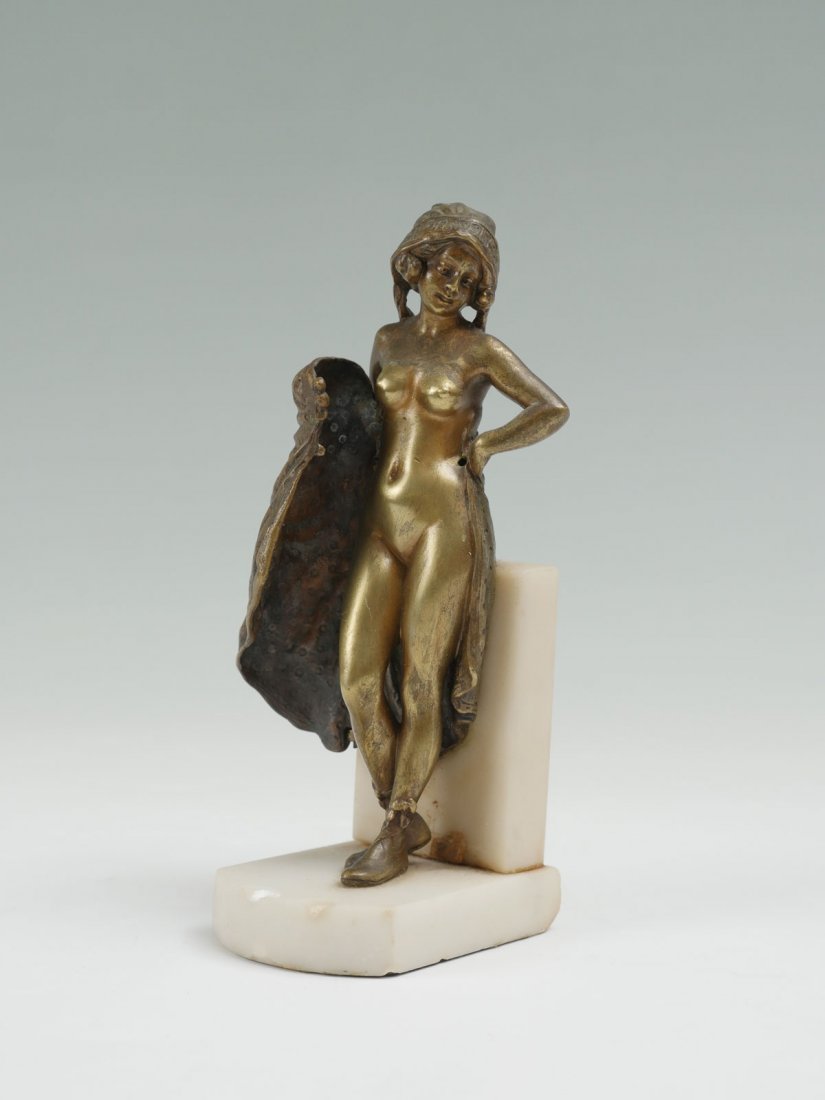 EROTIC NAUGHTY NUDE BRONZE: EROTIC NAUGHTY NUDE BRONZE: Hinged dress opens to reveal the birthday suit, 5.5'' h., affixed to alabaster base, 6'' overall.