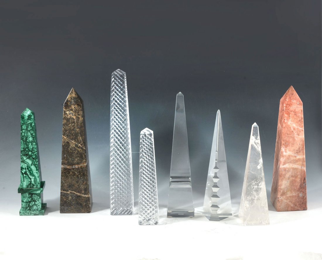 8 PIECE OBELISK COLLECTION: 8 PIECE OBELISK COLLECTION: 1) 10" brown granite obelisk; 2) 8.5" Malachite 4 faceted obelisk; 3) 8" natural crystal obelisk; 4) 8.5" clear glass obelisk with carved Asian temple design; 5) 10" Baccar