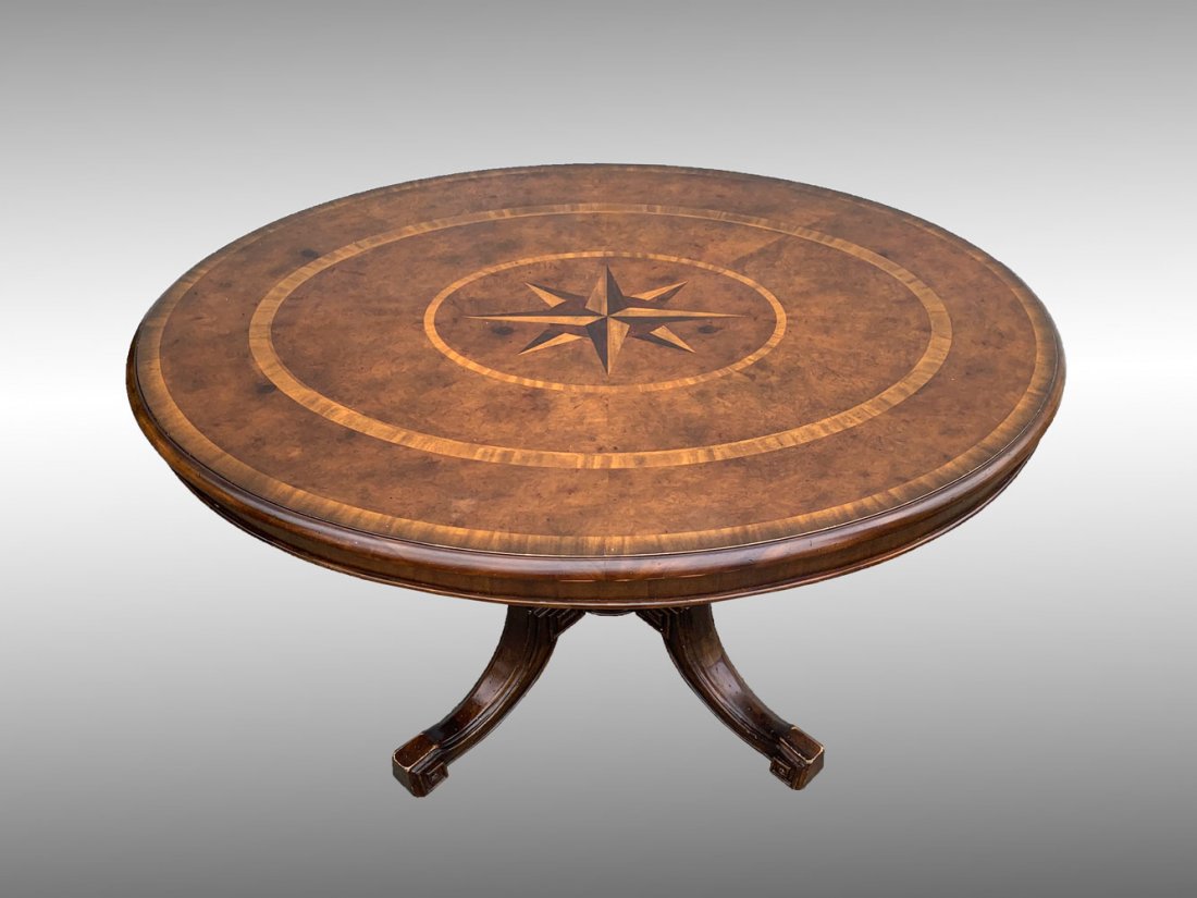JOHN RICHARDSON PARQUETRY COMPASS TABLE: JOHN RICHARDSON PARQUETRY COMPASS TABLE: Oval table top having a central inlaid compass with encompassing bands and burlwood. Raised on turned & carved supports with finial in center. Scrolling legs w