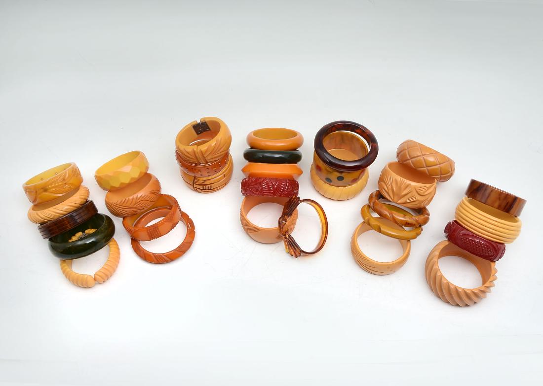 30 BAKELITE BRACELETS: 30 BAKELITE BRACELETS: Fantastic collection of Bakelite bracelets including many carved, many wide, several slimmer, one with colored dots. Have fun stacking them to explore your range of styles.