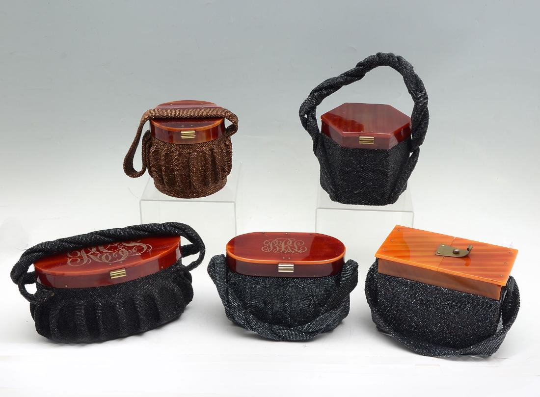 5 BEADED PURSES WITH BAKELITE TOPS: 5 BEADED PURSES WITH BAKELITE TOPS: 1) Copper colored glass beads cover this drum shaped box bag with Bakelite lid with braided and beaded strap; 2) 1950's black glass beaded hexagonal shaped box purs