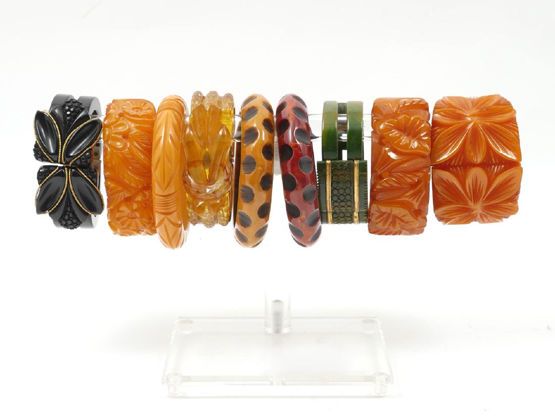 9 BAKELITE BRACELETS: 9 BAKELITE BRACELETS: Fantastic collection of Bakelite bracelets with beautiful floral carved designs, two with circular carvings, and six bracelets have hinge openings. Style them individually or sta